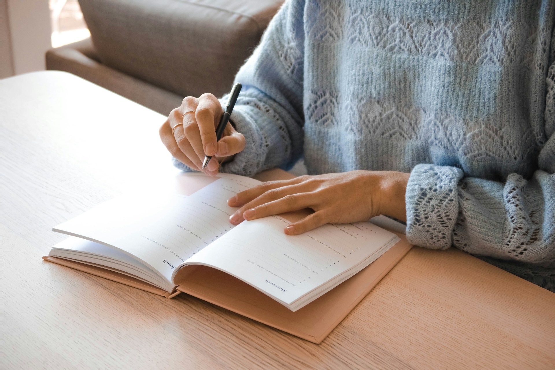 Woman writing on paper