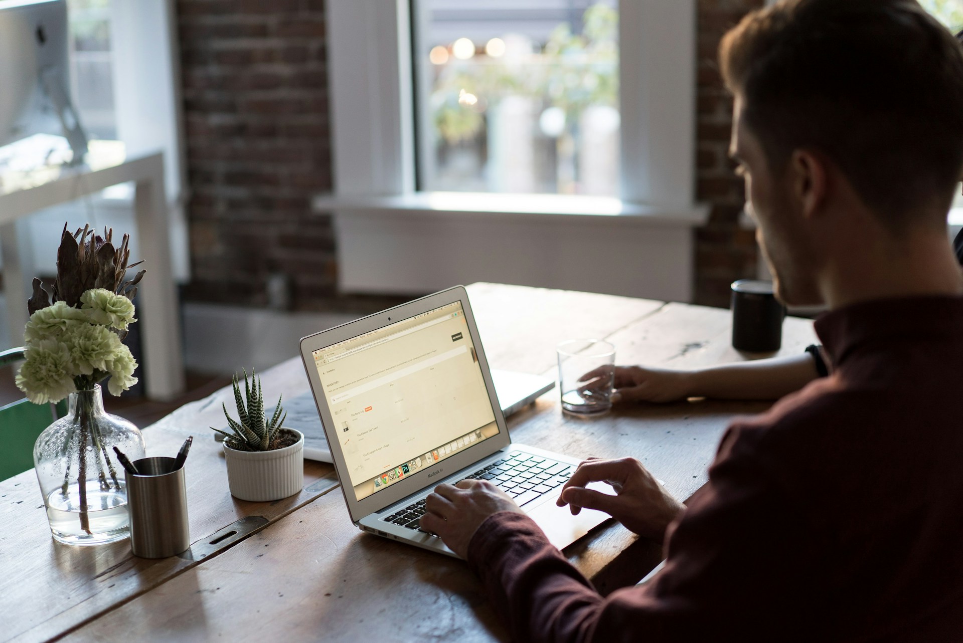 Man Operating Laptop ai