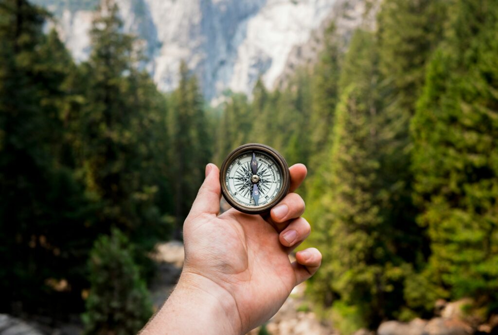 A Hand Holding a Compass, Stitha Prajna